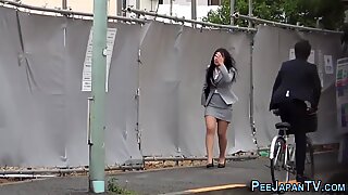 Naughty asian pissing